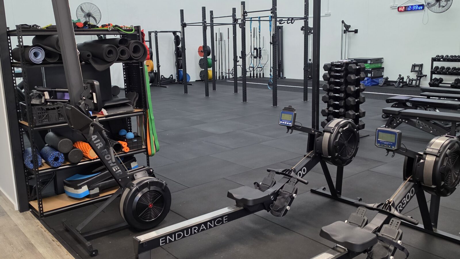 Rowing and cardio equipment in the Adapt Sports Physiotherapy rehabilitation gym.